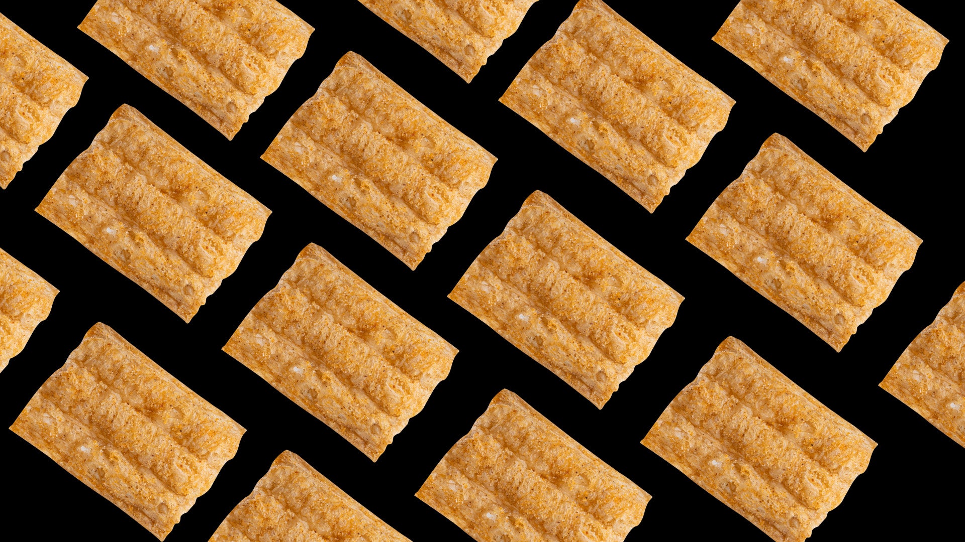 Cricket protein crackers by HexaCrunch – golden baked insect-based snack with crisp crunch.